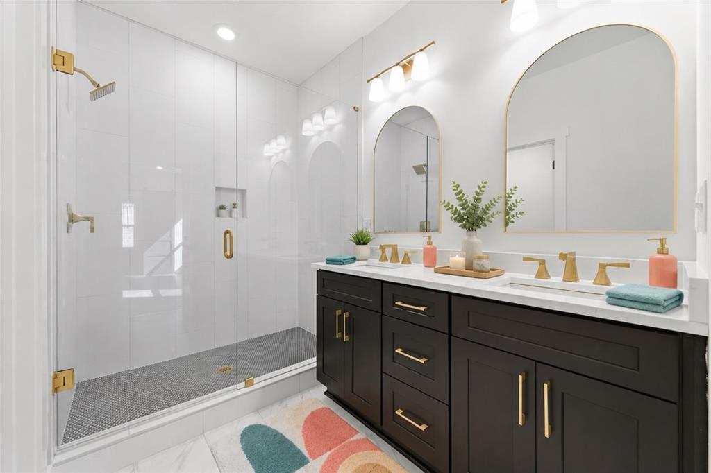 139 Old Alabama Road Southeast Emerson, GA 30137 - Photo 20 of 50 a spacious bathroom with a granite countertop sink mirror and shower