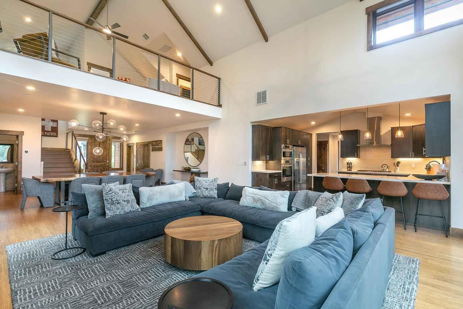 11655 Henness Road Truckee, CA 96161 - Photo 16 of 21 a living room with furniture and a large window
