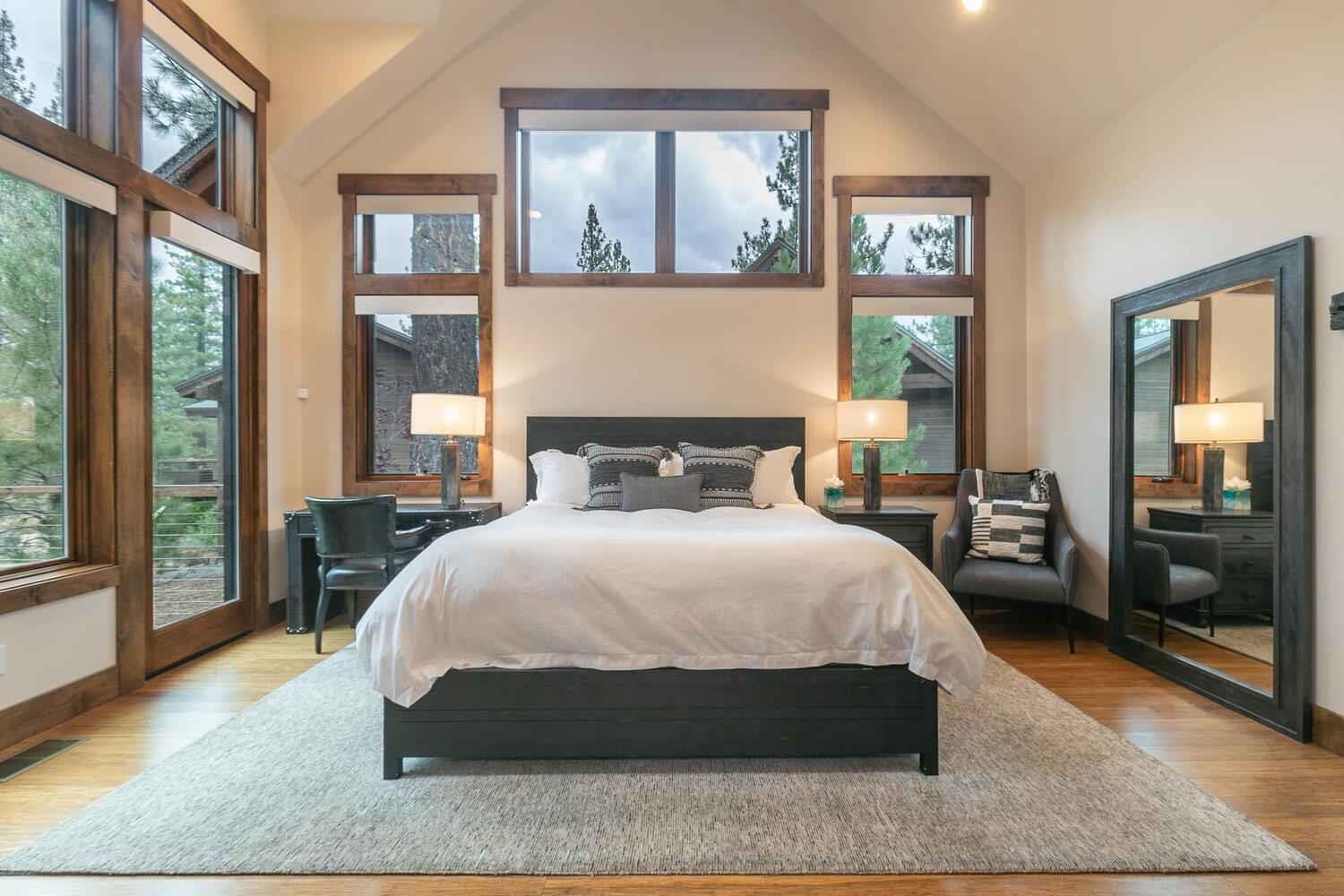 11655 Henness Road Truckee, CA 96161 - Photo 21 of 21 a bedroom with a large bed and a large window