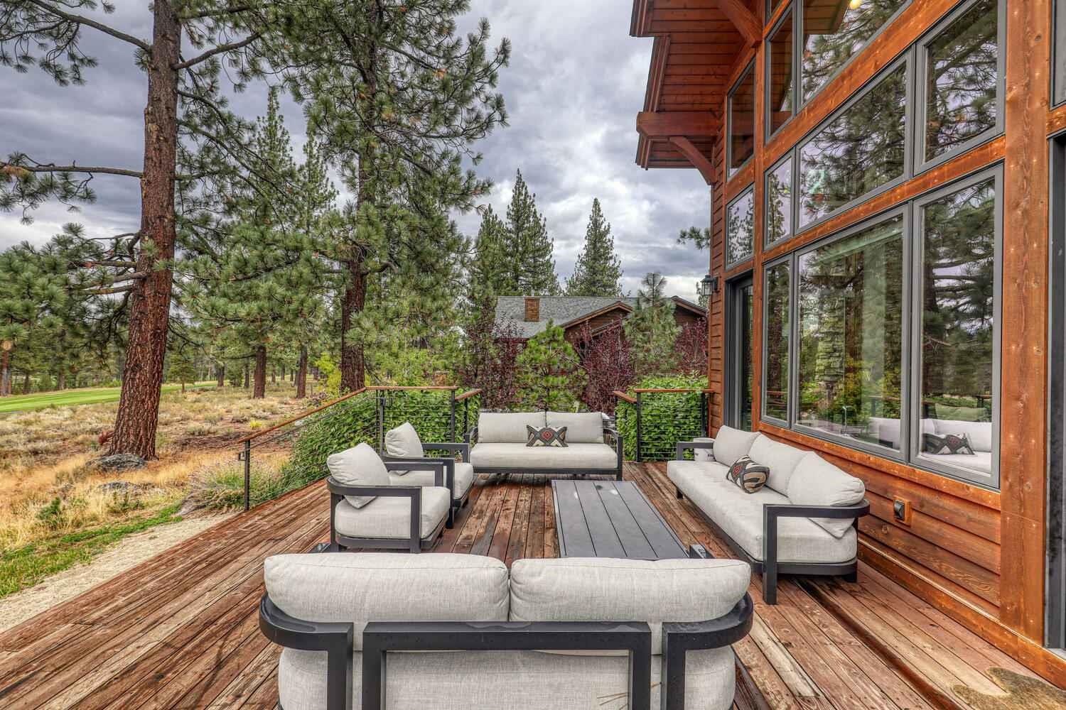 11655 Henness Road Truckee, CA 96161 - Photo 5 of 21 a view of a patio with couches chairs and wooden floor