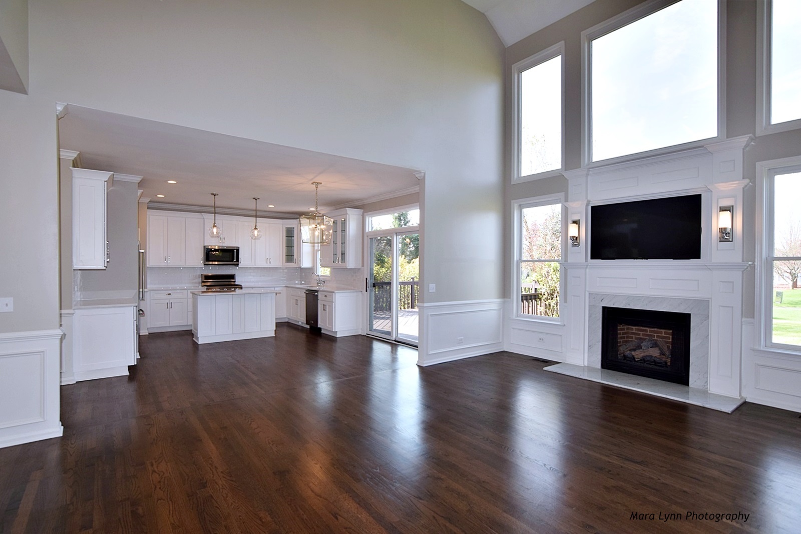 2231 Fargo Boulevard Geneva, IL 60134 - Photo 3 of 24 a view of a kitchen with furniture and a fireplace