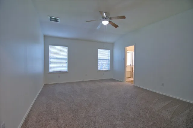 a bathroom with a bathtub and a sink