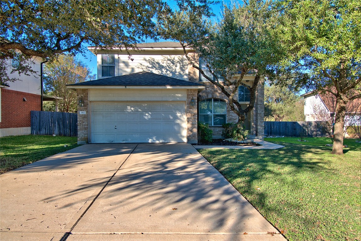 3112 Blue Ridge Drive Round Rock, TX 78681 - Photo 2 of 22 a front view of house with yard