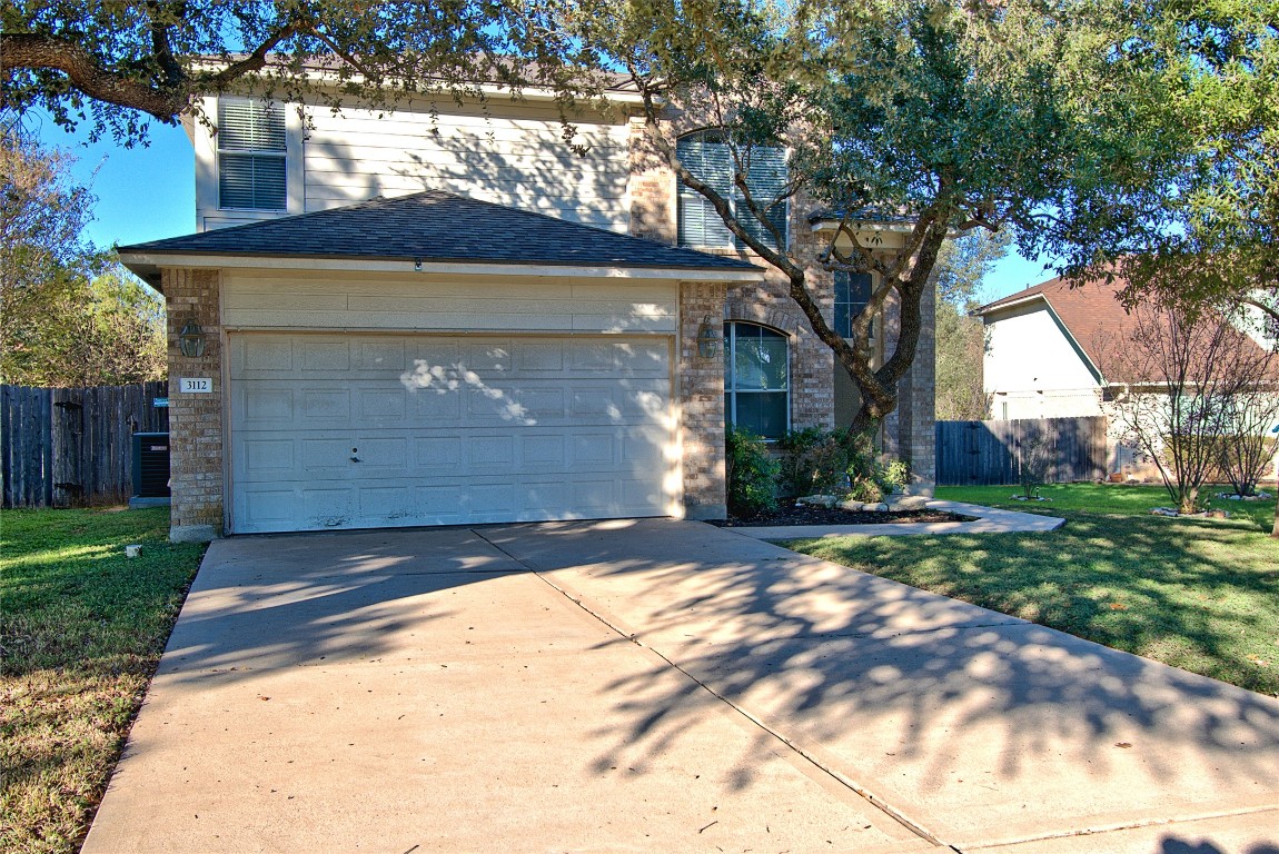 3112 Blue Ridge Drive Round Rock, TX 78681 - Photo 3 of 22 a view of house with backyard space and garden
