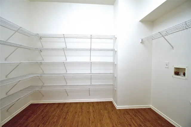 a view of a room with racks on the wall