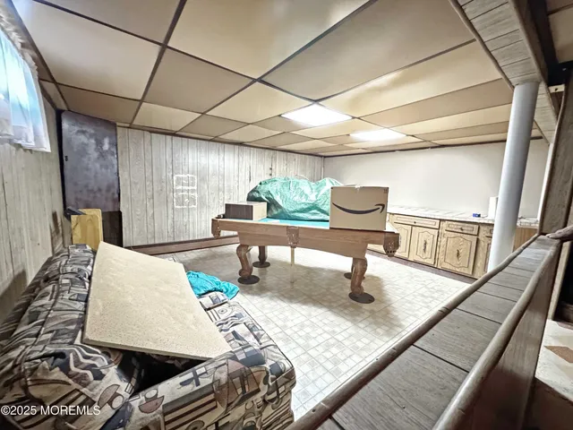 a living room with a couch and a table