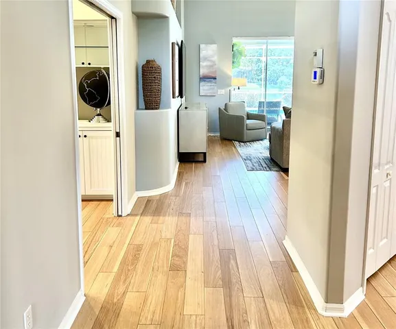 a view of living room with furniture and a window