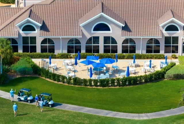 a view of a golf course with a house