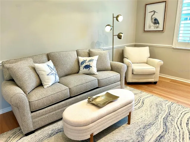 a living room with furniture and a couch