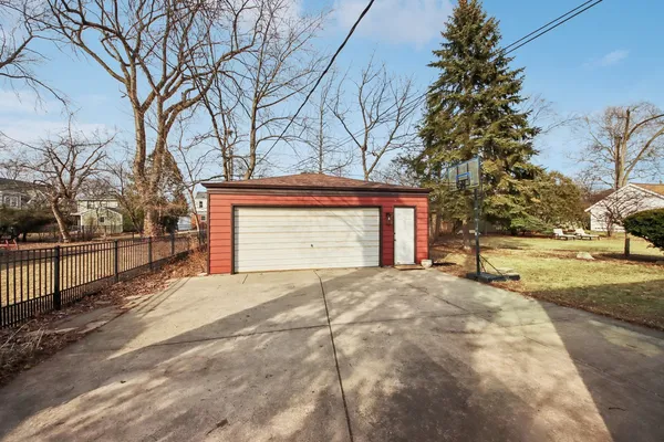 a view of garage yard and tree