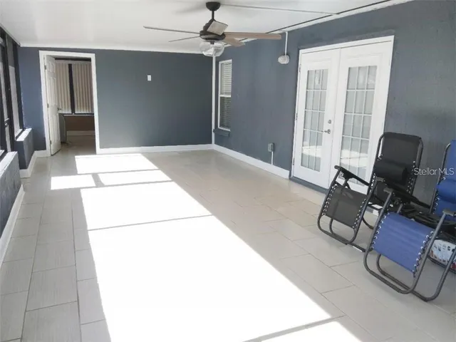 a workspace with furniture and a window