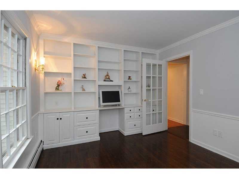 71 Delafield Island Road Darien, CT 06820 - Photo 13 of 25 a kitchen with cabinets and wooden floor