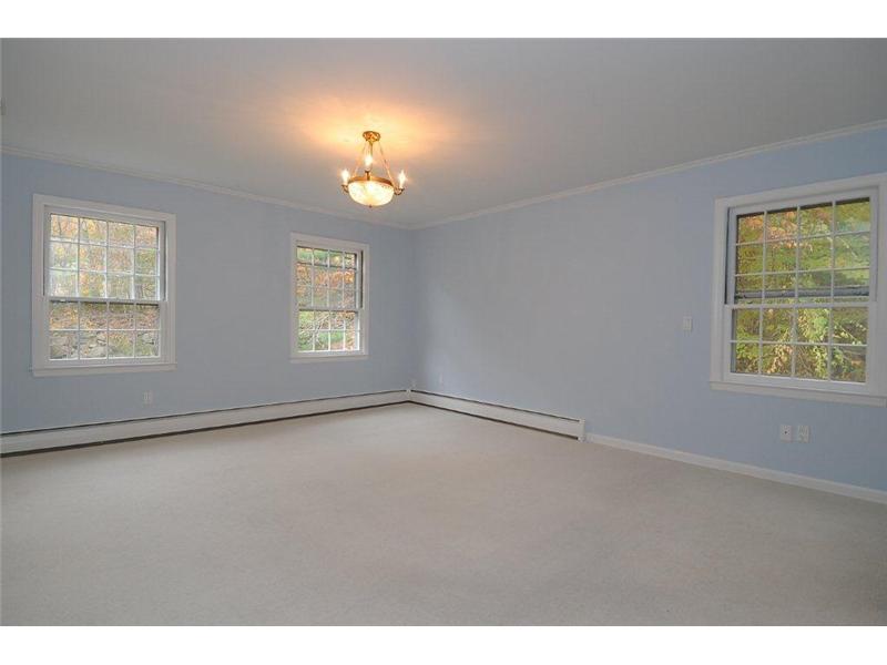 71 Delafield Island Road Darien, CT 06820 - Photo 15 of 25 a view of an empty room with a window