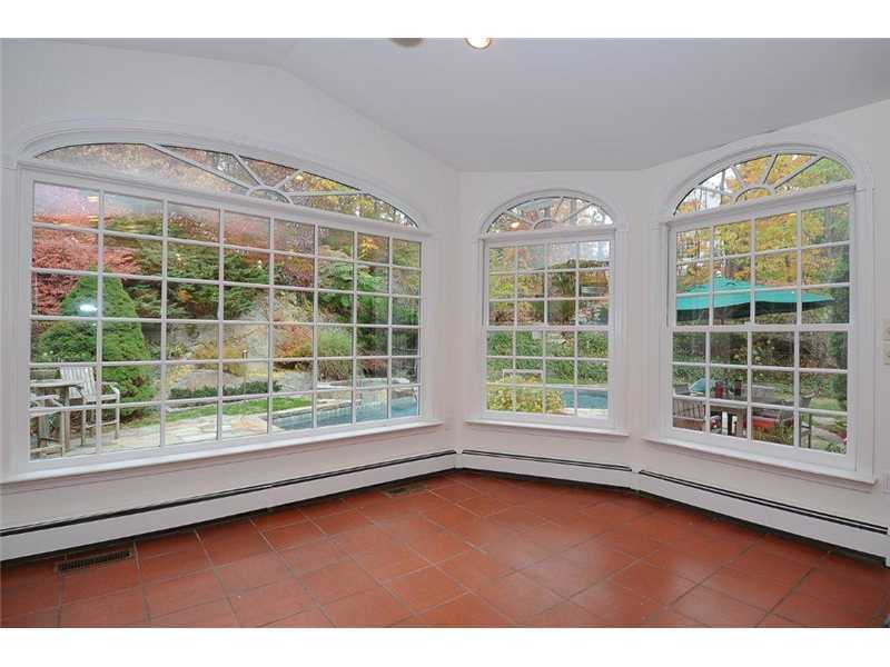 71 Delafield Island Road Darien, CT 06820 - Photo 6 of 25 a view of an empty room with a window