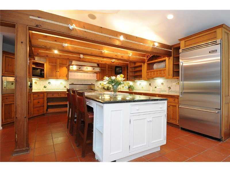 71 Delafield Island Road Darien, CT 06820 - Photo 8 of 25 a kitchen with stainless steel appliances kitchen island granite countertop a sink and cabinets