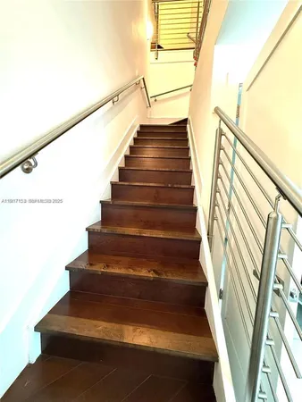 a utility room with sink dryer and washer