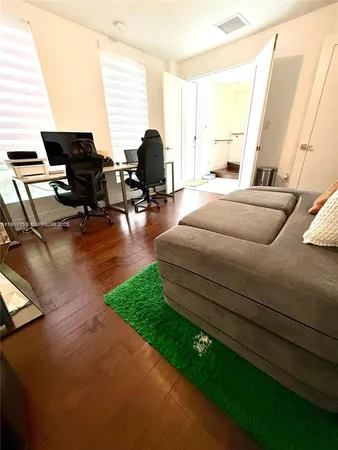 a view of a terrace with chairs