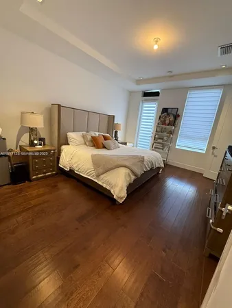 a view of a living room with furniture