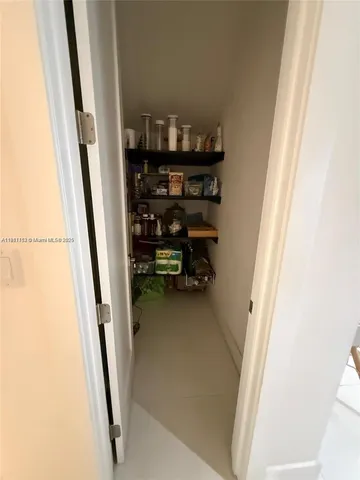 a bed room with furniture and a window