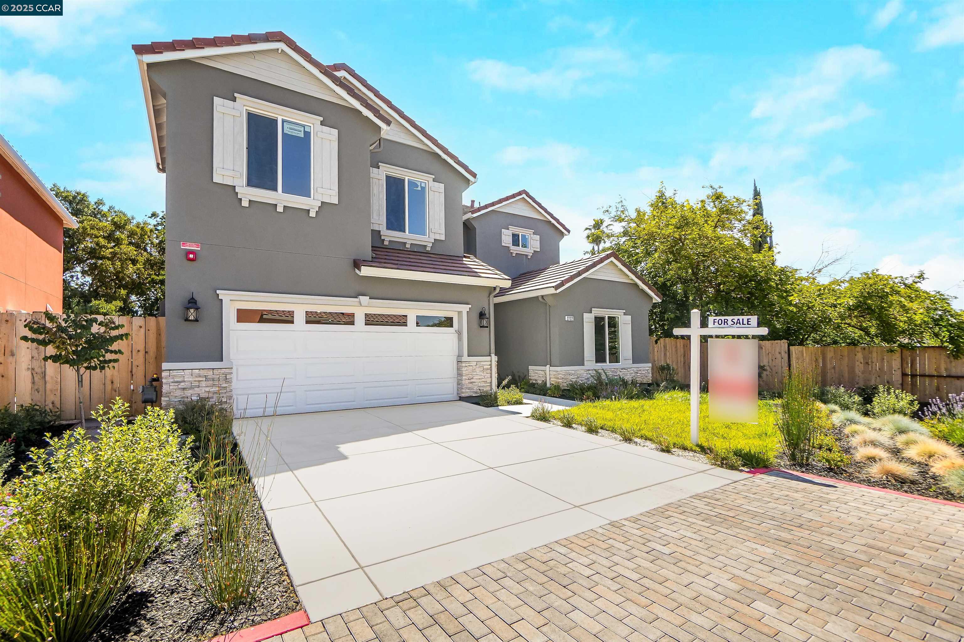 2722 Cowell Road Concord, CA 94518 - Photo 1 of 55 a front view of a house with a yard and garage
