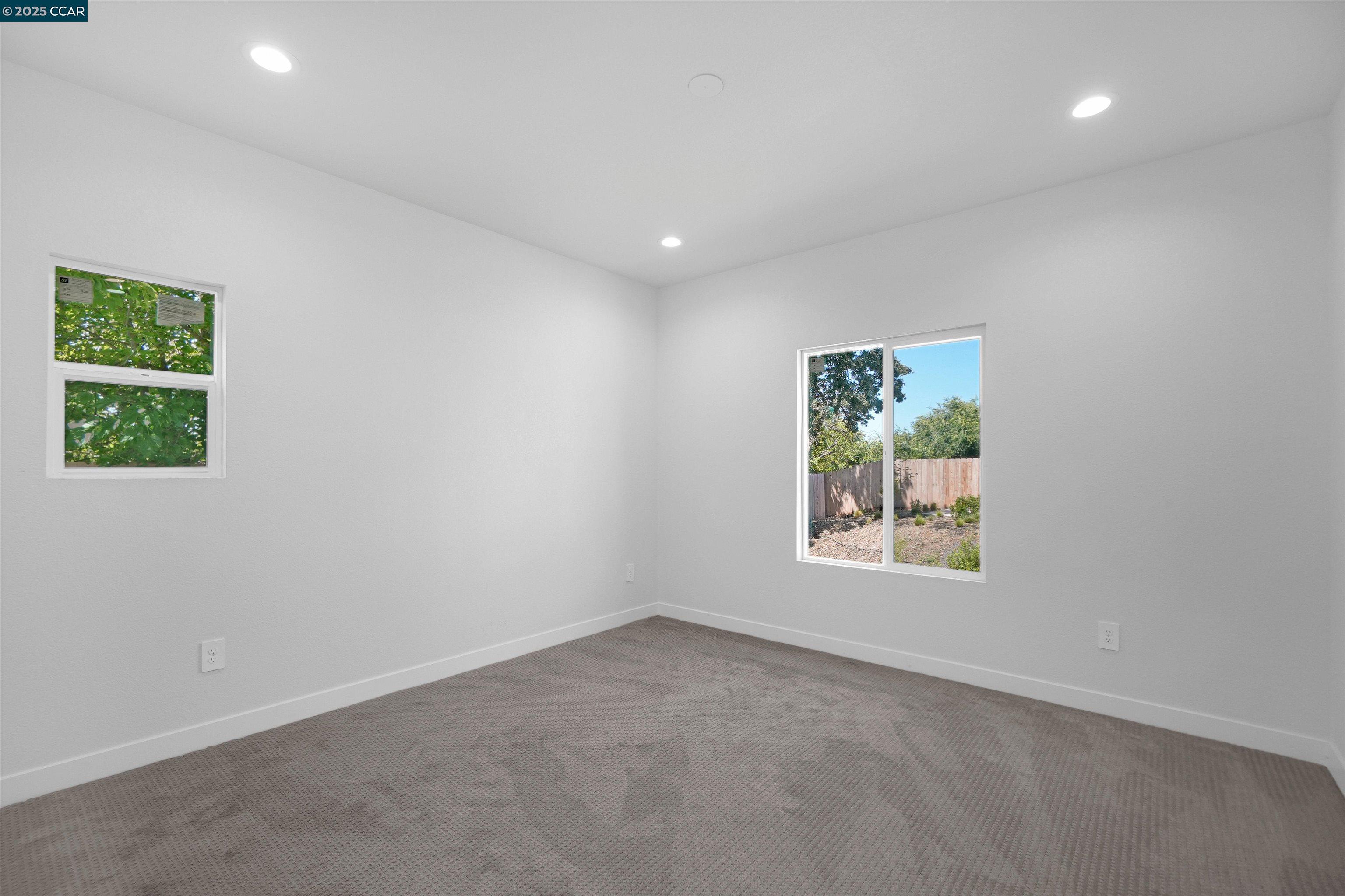 2722 Cowell Road Concord, CA 94518 - Photo 17 of 55 an empty room with windows