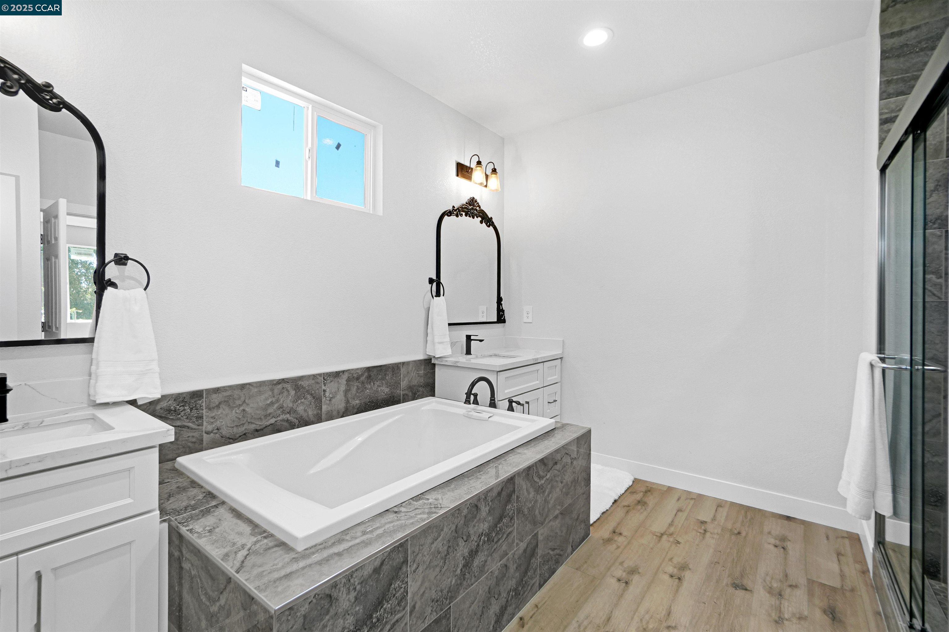 2722 Cowell Road Concord, CA 94518 - Photo 19 of 55 a bathroom with a sink and a mirror