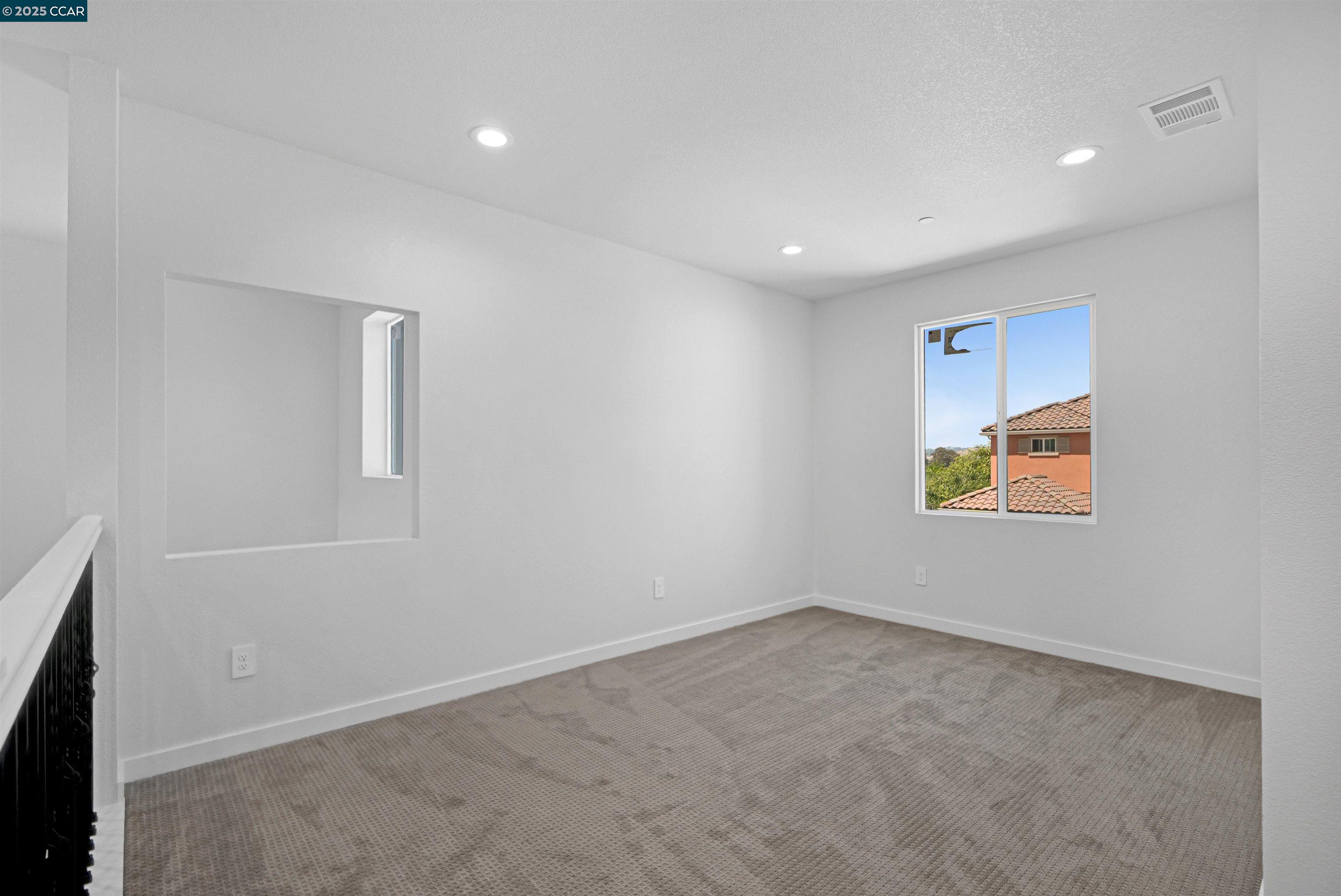 2722 Cowell Road Concord, CA 94518 - Photo 25 of 55 an empty room with windows