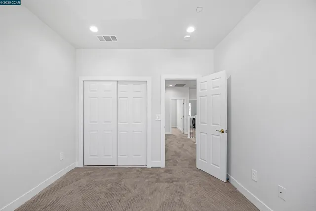 a bathroom with mirror and sink