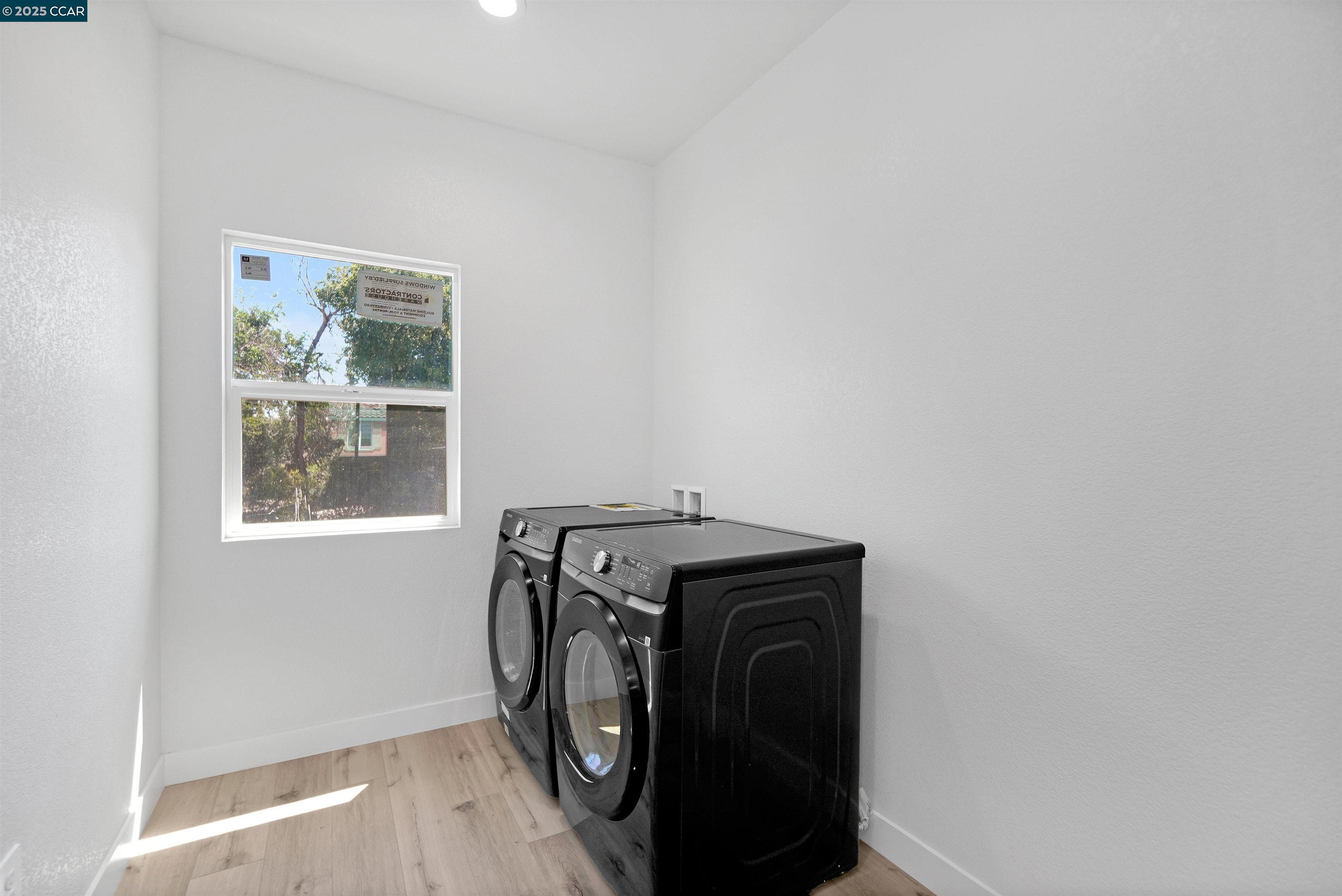 2722 Cowell Road Concord, CA 94518 - Photo 35 of 55 a utility room with dryer and washer