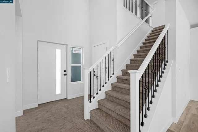 a view of an entryway with staircase