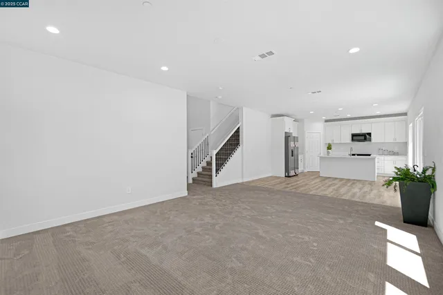 a view of a kitchen with furniture and a kitchen