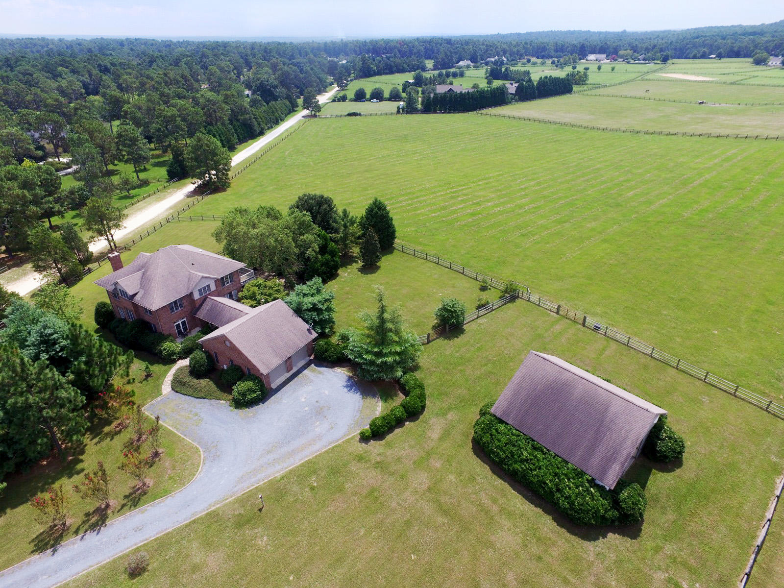 650 Yadkin Road Southern Pines, NC 28387 - Photo 4 of 60 Drone House to Field