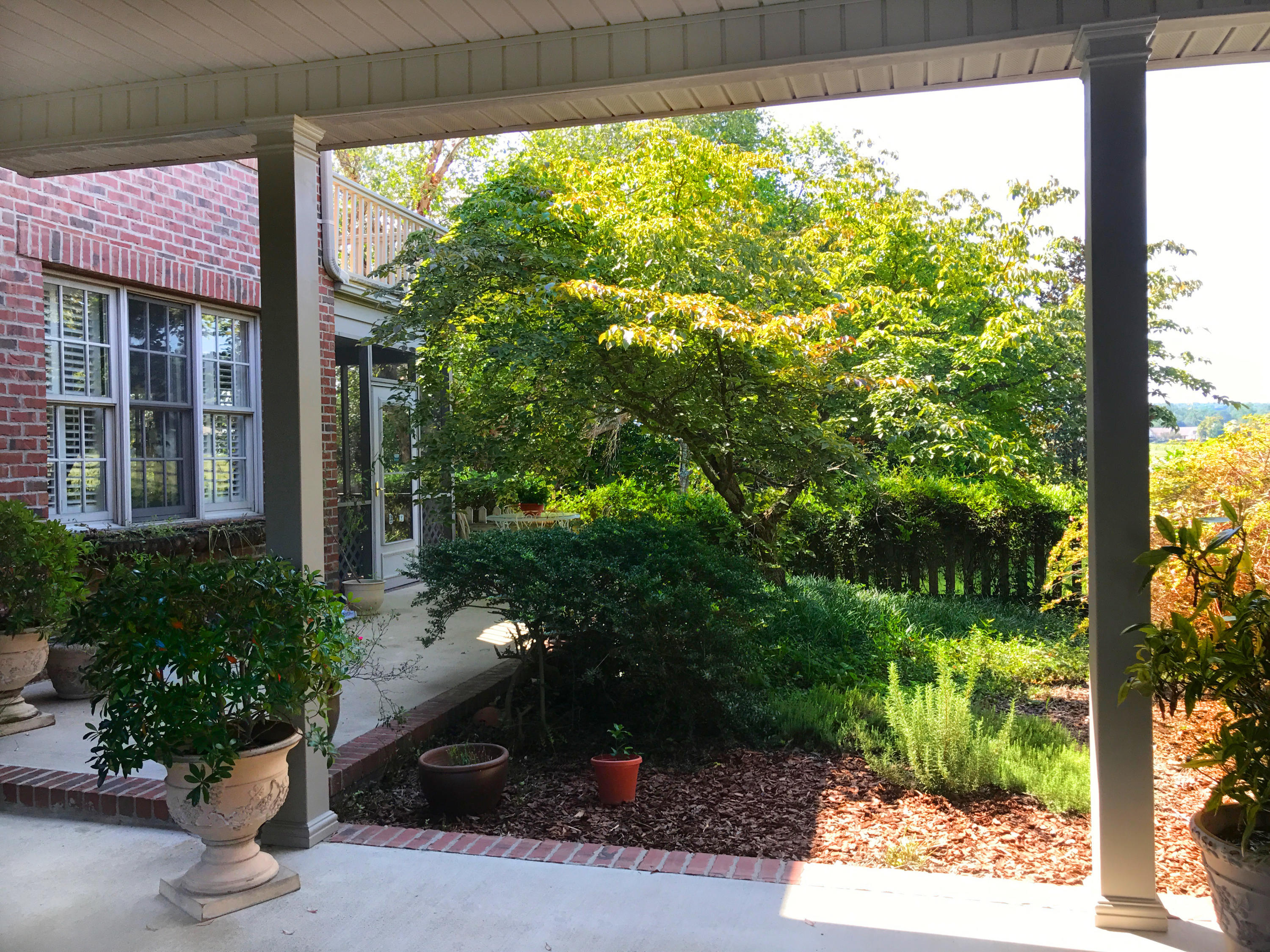 650 Yadkin Road Southern Pines, NC 28387 - Photo 8 of 60 Breezeway to back porch