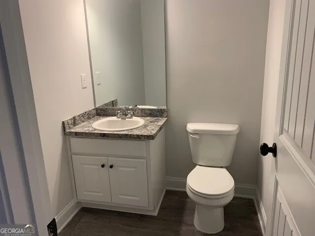 a bathroom with a sink and a toilet