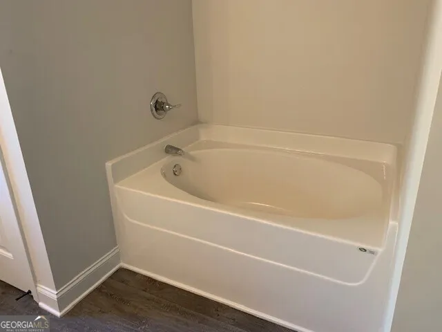 a bathroom with a bathtub