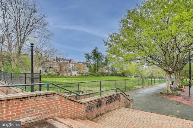 a view of street with sitting area