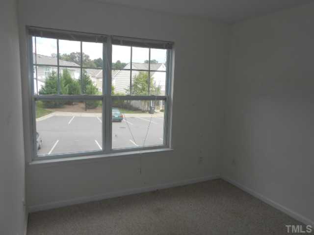 3823 Bison Hill Lane Raleigh, NC 27604 - Photo 8 of 8 an empty room with a window