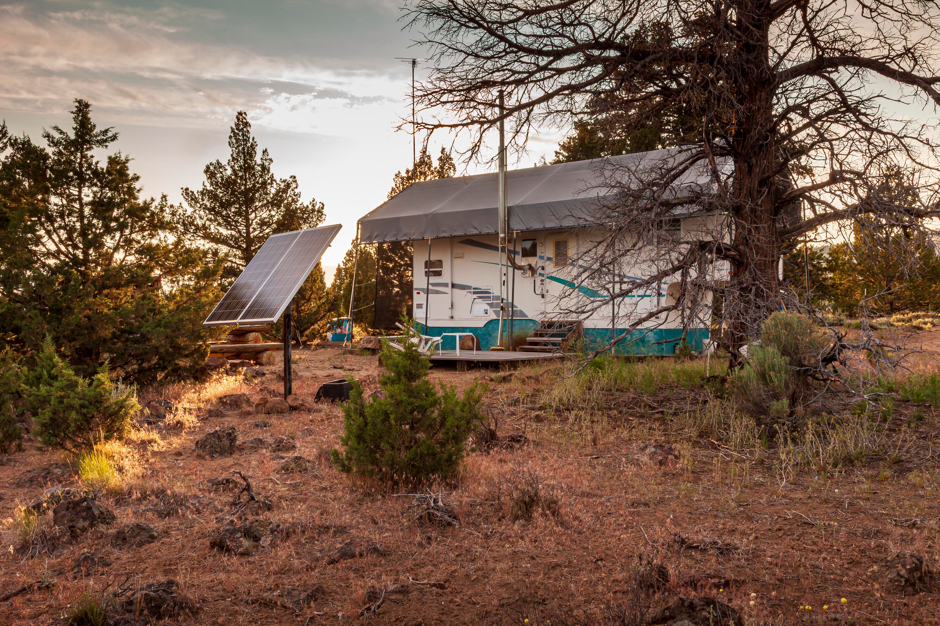 0 Rd 25 Aka Golden View Ranch Rd Bend, Unit LOT 30 Bend, OR 97701 - Photo 7 of 34 240-watt solar array, with RV behind.