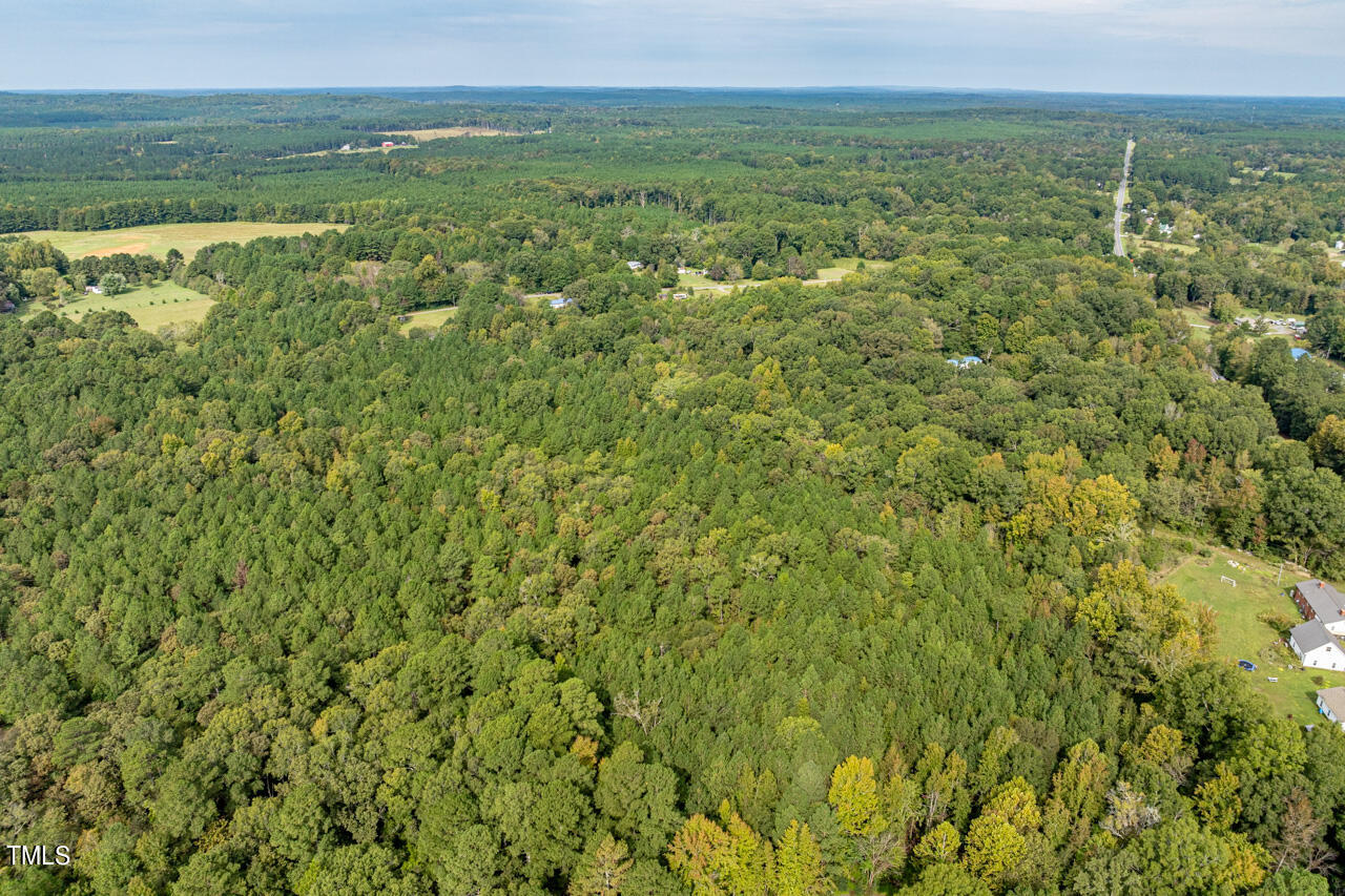 401 Major Lee Road Pittsboro, NC 27312 - Photo 11 of 23 a view of a field with an ocean view