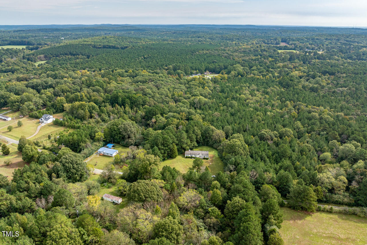 401 Major Lee Road Pittsboro, NC 27312 - Photo 18 of 23 a view of a field with an ocean
