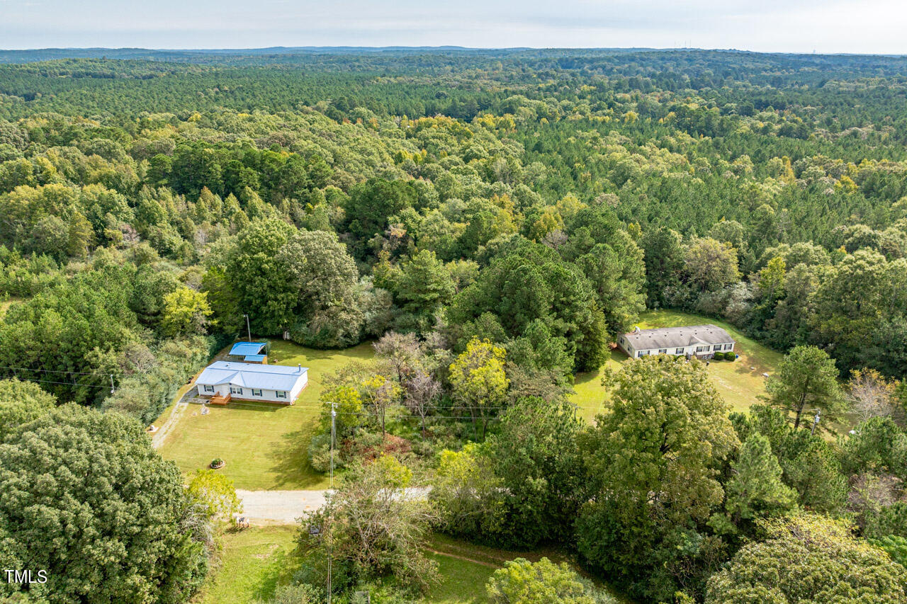 401 Major Lee Road Pittsboro, NC 27312 - Photo 21 of 23 a view of a yard with an outdoor seating