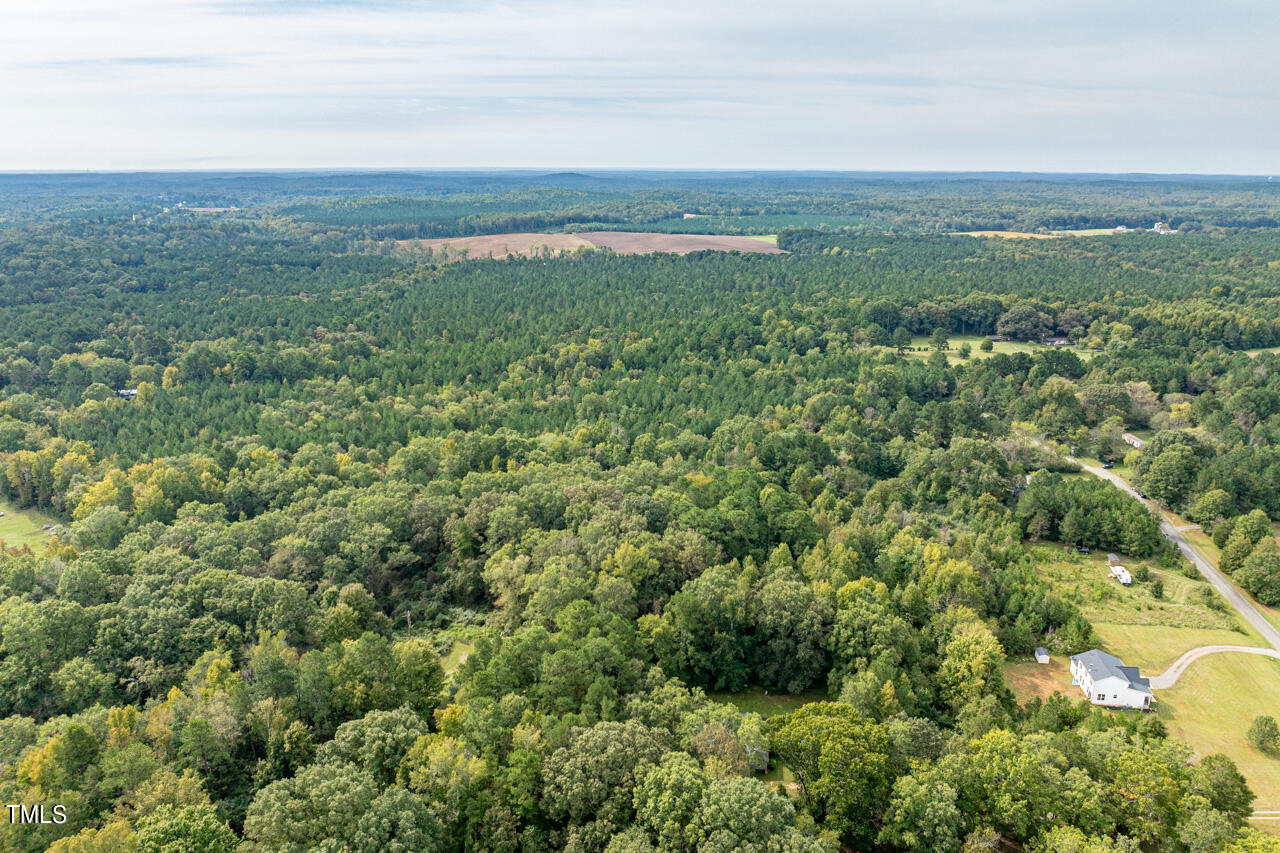 401 Major Lee Road Pittsboro, NC 27312 - Photo 6 of 23 a view of a field with an ocean
