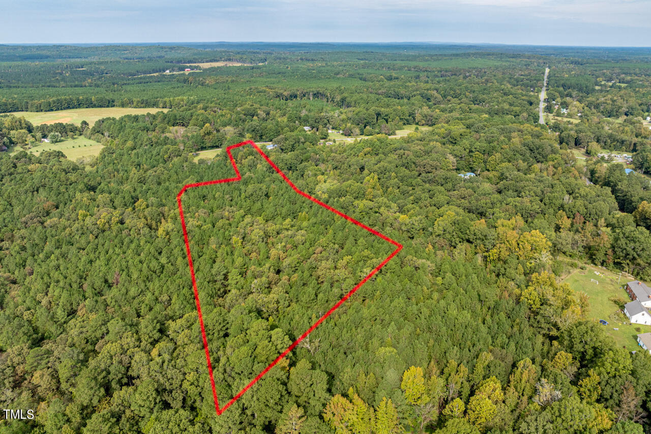 401 Major Lee Road Pittsboro, NC 27312 - Photo 10 of 23 a view of a field with an ocean
