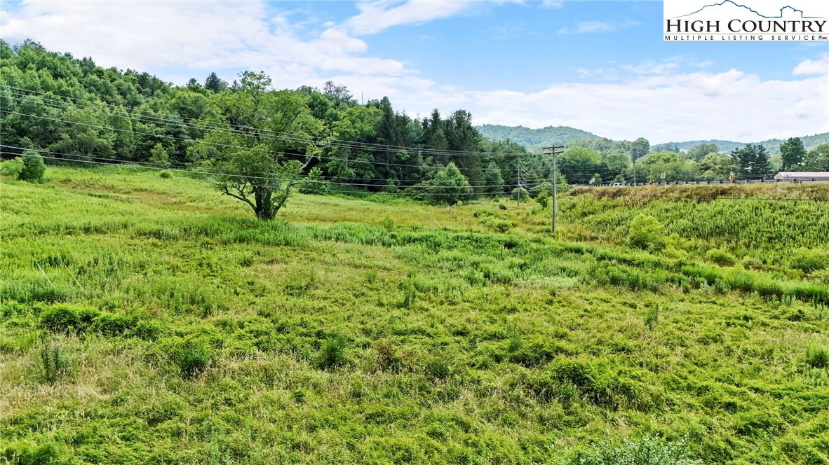 Deep Gap Drive Deep Gap, NC 28618 - Photo 3 of 31 a view of a green field with lots of bushes