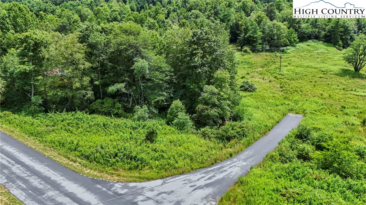 Deep Gap Drive Deep Gap, NC 28618 - Photo 10 of 31 a view of a garden with a bench