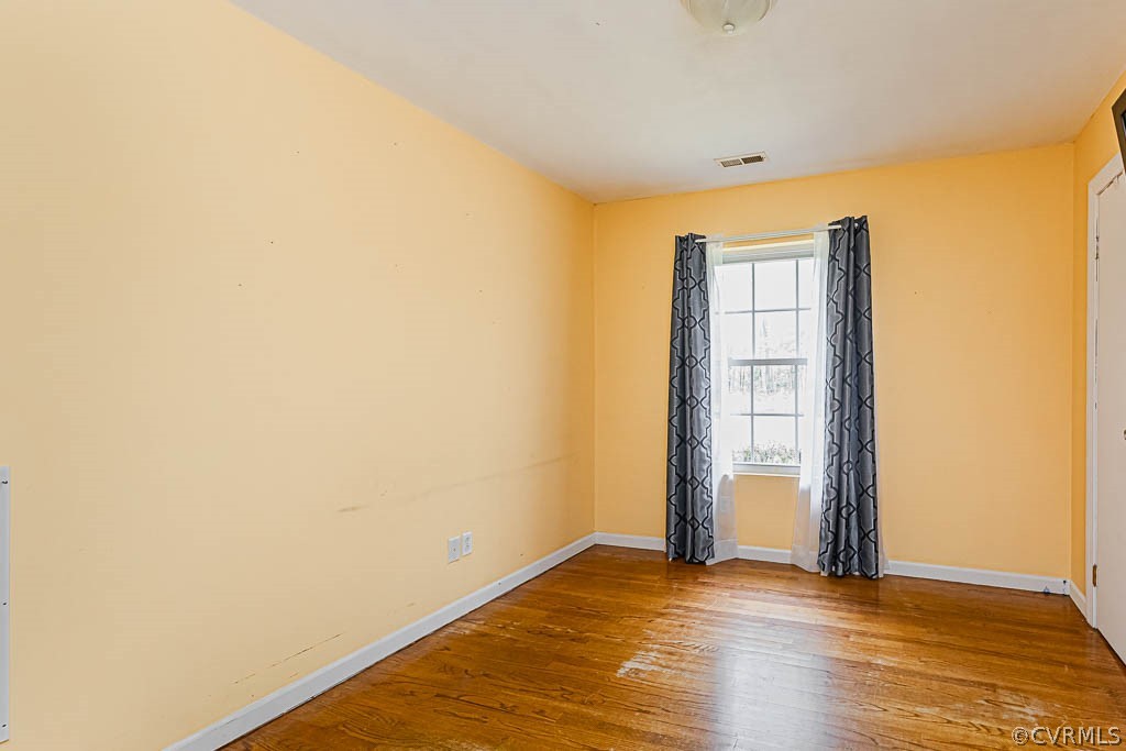 16273 Old Ridge Road Montpelier, VA 23192 - Photo 24 of 49 a view of an empty room with wooden floor and a window