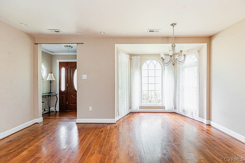 16273 Old Ridge Road Montpelier, VA 23192 - Photo 6 of 49 wooden floor in an empty room with a window