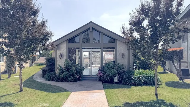 a house view with a outdoor space