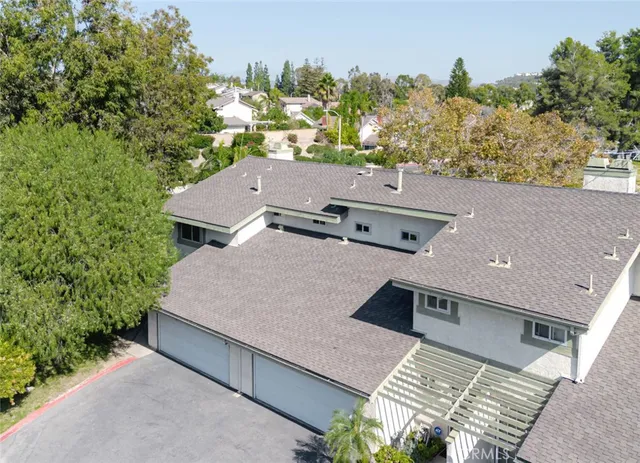 a view of swimming pool with a yard and seating space