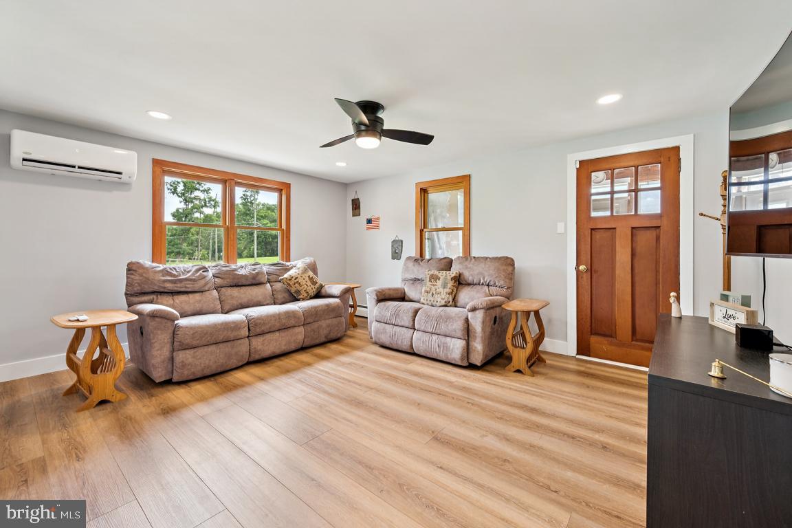 26 Hilliards Bridge Road Southampton, NJ 08088 - Photo 6 of 24 a living room with furniture and a large window